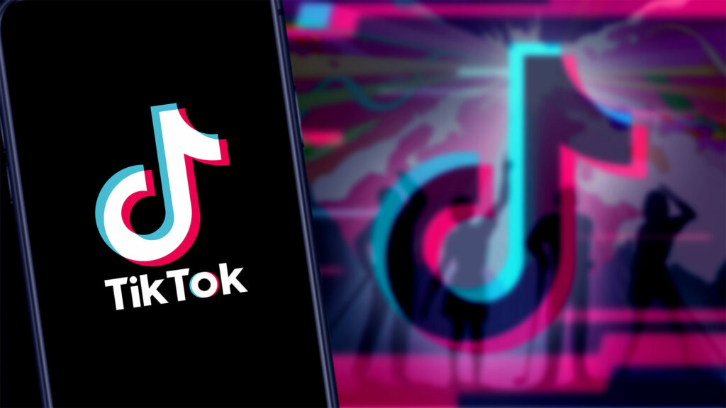 Tiktok logo on smartphone with brand colours in background