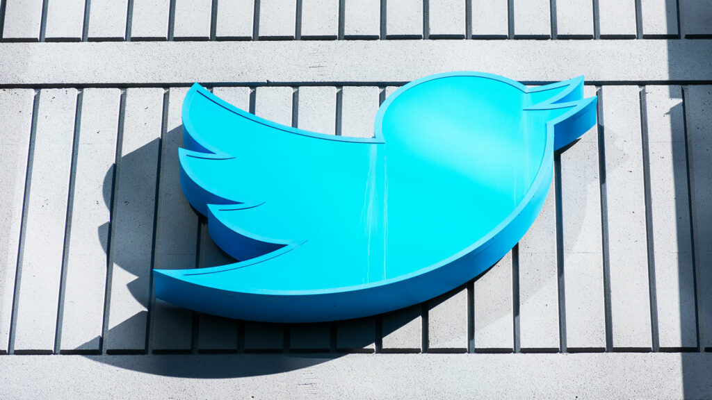 Twitter logo against side of building