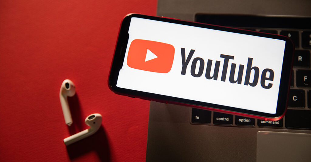 YouTube logo on smartphone screen