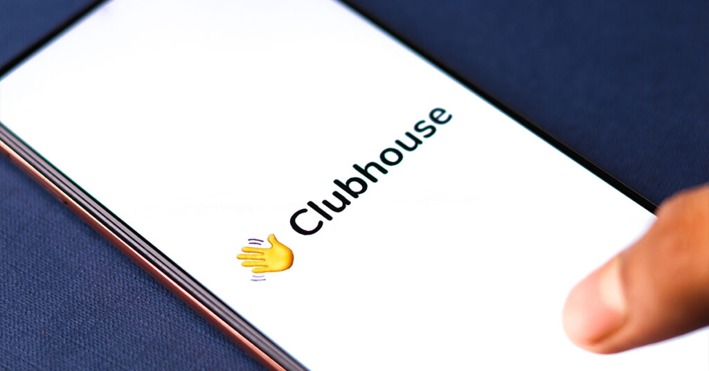Smartphone with Clubhouse logo on screen