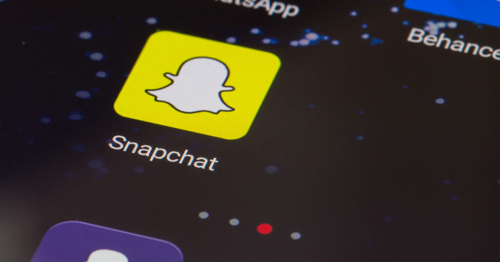 Smartphone with Snapchat logo on screen