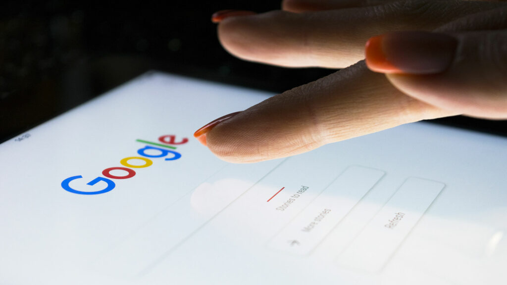 Person using Google Search on tablet device