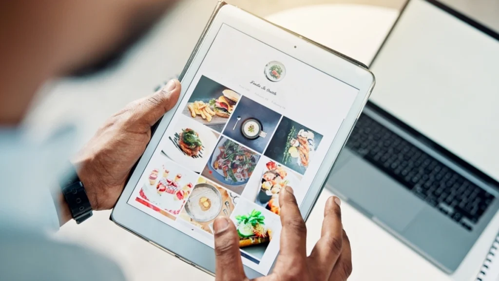 Man scrolling though social media exploring different food posts