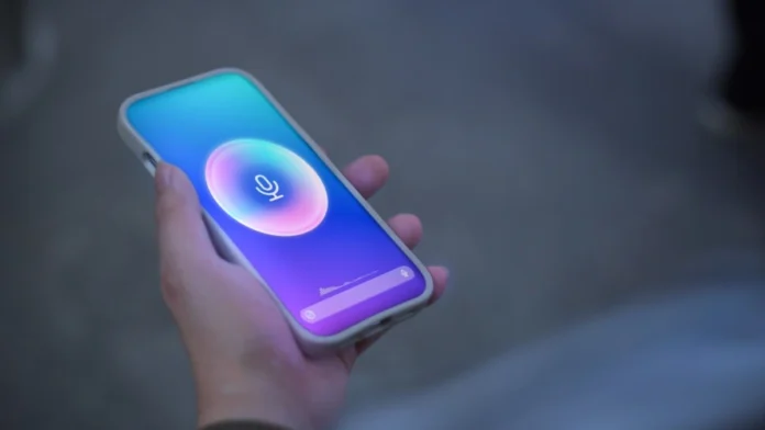 Man holding hid phone out using an AI assistant and the microphone icon glows on the phone.